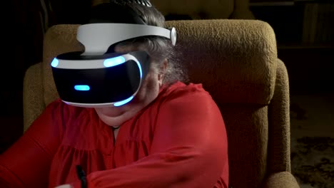 Elderly-woman-in-VR-headset-uses-move-motion-controller-for-video-game-console