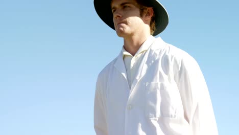 Cricket-umpire-signaling-out-sign-during-match