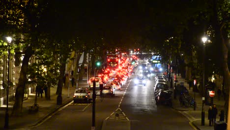 Night-traffic-jam-drives-down-towards-Tower-of-London-and-Tower-Bridge-in-London.