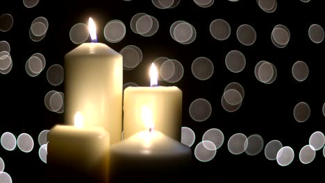 Four-white-candles-light-with-bokeh