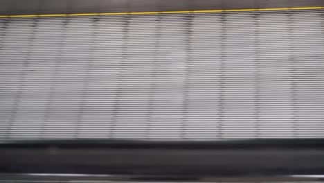 Foot-business-girl-on-escalator