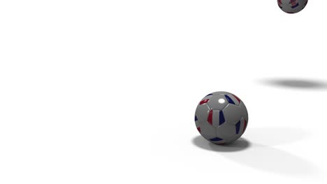 Balón-de-fútbol-con-la-bandera-de-Francia-y-un-balón-de-fútbol-con-la-bandera-de-Croacia-saltando-contra-fondo-blanco,-render-3d,-material-prores.