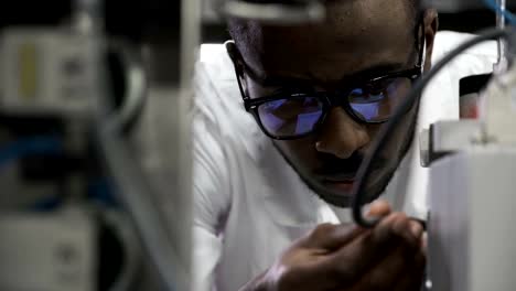 Engineer-soldering-wires-and-circuits-at-work