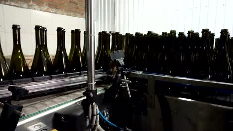 Bottling-and-sealing-conveyor-line-at-winery-factory