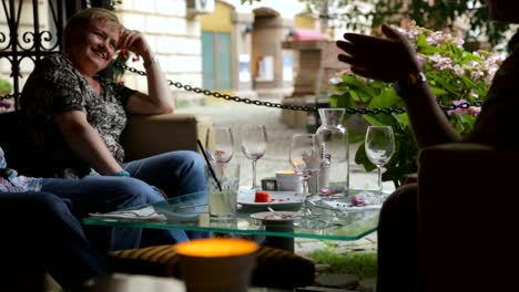 People-drinking-wine-in-street-cafe