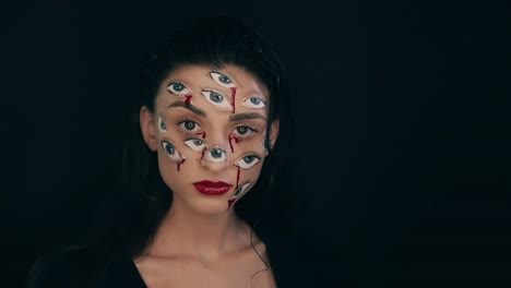 Maquillaje-de-Arte-Halloween,-la-mujer-tiene-muchos-ojos-en-una-cara