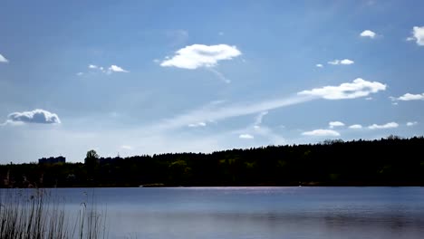 Beautiful-clouds-moving-over-lake-or-river