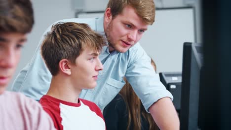 Teenage-Students-Studying-In-IT-Class-With-Teacher