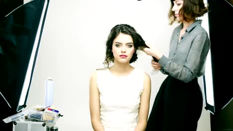 Makeup-applying.-White-dress