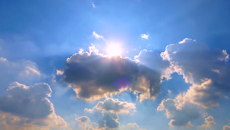 4K.Time-lapse-Moving-clouds-and-white-clouds-flying-on-blue-sky-with-sun-rays