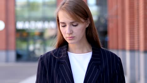 upset-Sad-Business-Woman-with-Grief-Standing-Outside