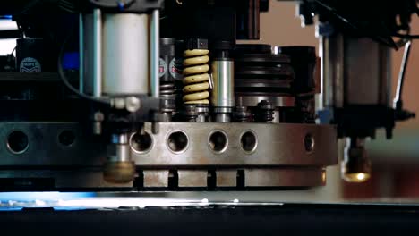 CNC-Machine-Produces-Metal-Detail-on-Factory