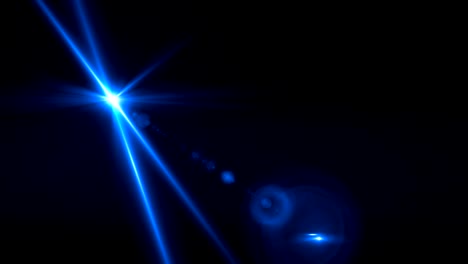 Abstract-lens-flare-light-over-black-background.sun-burst-on-black-background-motion-video.cross-blue-light-effect-video