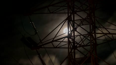 the-moon-in-the-cloudy-sky,-visible-through-the-power-line-support,-time-lapse.