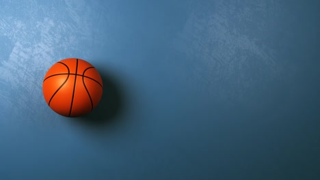 Basketball-Ball-Rotating-on-Blue-Background-with-Copyspace