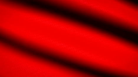 Bandera-Roja-ondeando-textil-textura-de-fondo.-Seamless-Loop-animación.-Pantalla-completa.-Cámara-lenta.-Vídeo-de-4-K