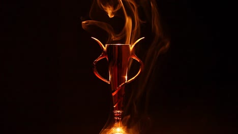 gold-cup-smoke-dark-background-hd-footage