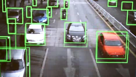 CCTV-camera.-Real-time-tracking-of-vehicles-and-people-on-the-street.-Authentic-pixelated-image-from-a-real-monitor.