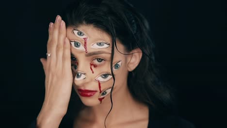 Maquillaje-de-Arte-Halloween,-la-mujer-tiene-muchos-ojos-en-una-cara