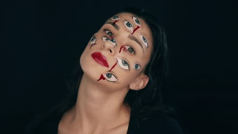 Maquillaje-de-Arte-Halloween,-la-mujer-tiene-muchos-ojos-en-una-cara