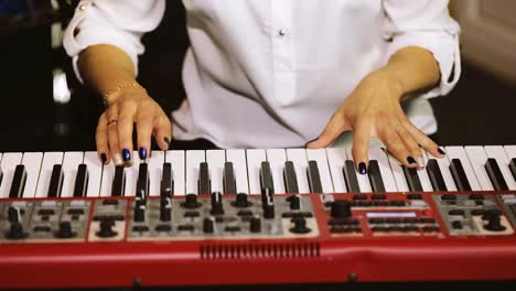 Girls-Hands-Playing-on-Piano