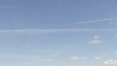 Blue-unclouded-sky-slowly-filling-up-with-rain-clouds;-time-lapse-shot