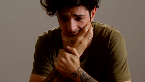 worried-and-upset-young-man,-close-up-portrait