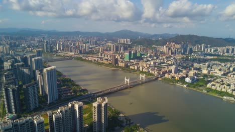 China-Sonnentag-Zhuhai-Stadt-berühmten-Leben-blockieren-am-Flussufer-aerial-Panorama-4k-Zeitraffer