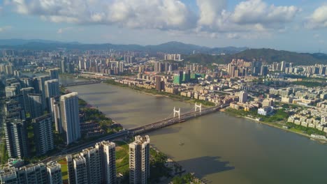 vida-del-famoso-ciudad-zhuhai-China-día-soleado-bloque-panorama-aéreo-fluvial-4k-lapso-de-tiempo