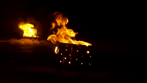 Fire-flame-close-up-loopable.-Closeup-of-fire-burning-on-black-background-in-slow-motion.