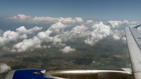 Fluing-over-Mexico-coast-line-clouds-sunny-day