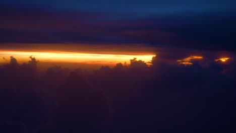 COPY-SPACE:-Puffy-clouds-and-purple-sky-cover-up-picturesque-orange-sunrise.