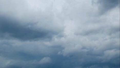 Clouds-forming-and-passing-by-over-the-sky-in-Time-lapse