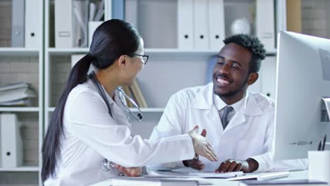 Doctors-Discussing-Medical-Research-Project