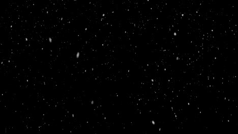 Winter-snowfall.-Uniform-fall-of-soft-snow-on-a-black-background.-looped