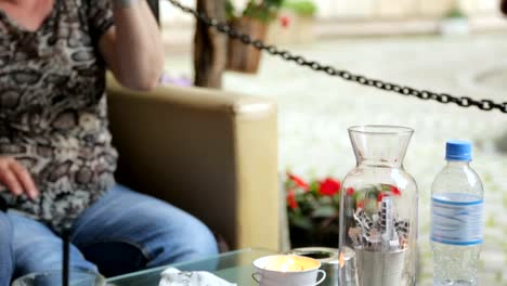 People-drinking-wine-in-street-cafe