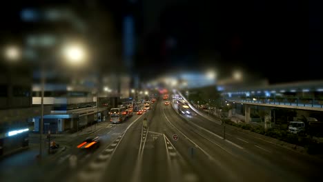 Street-traffic-at-night-modern-urban-landscape-and-the-bustling-streets