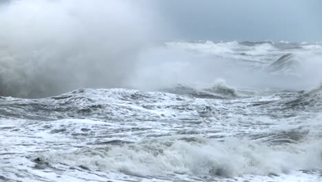 High-wave-breaking-on-the-rocks-of-the-coastline.-Extremely-Big-Wave-crushing-coast-,-Large-Ocean-Beautiful-Wave.-Super-Slow-Motion.