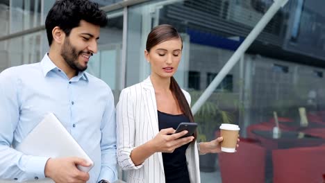 Business-People-Going-To-Work-With-Phone-And-Coffee-On-Street