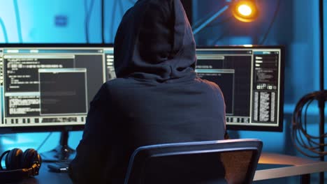 hacker-creating-computer-virus-for-cyber-attack