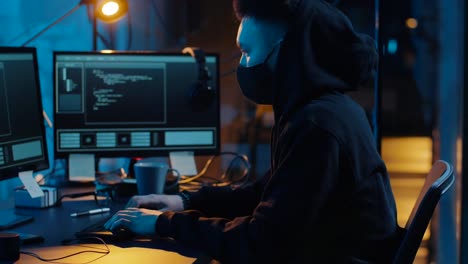 hacker-using-computer-for-cyber-attack-at-night