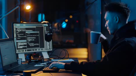 hacker-using-computer-for-cyber-attack-at-night