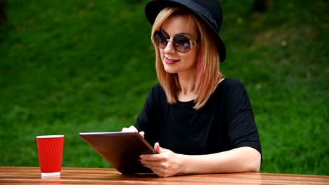 Hipster-Girl-Using-Digital-Tablet