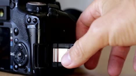 Remove-the-memory-card-from-slot,-into-the-camera.