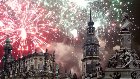 Sculpture-on-the-Bruhl-Terrace-and--Hofkirche-or-Cathedral-of-Holy-Trinity-and-holiday-fireworks---baroque-church-in-Dresden,-Sachsen,-Germany