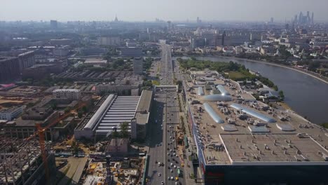 russia-sunny-day-moscow-city-mall-construction-traffic-road-aerial-panorama-4k