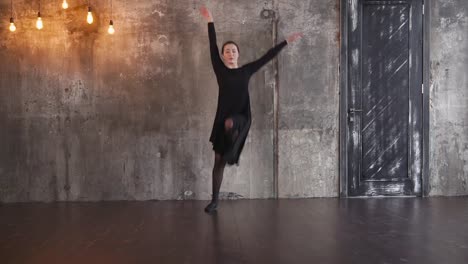 a-young-choreographer-dances-in-the-studio,-she-moves-her-hands-and-body