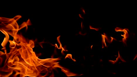 Flames-of-fire-on-black-background-in-slow-motion