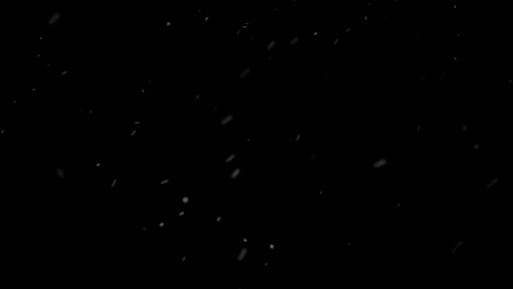 Heavy-snow-falling-on-black-background-looped-for-overlay