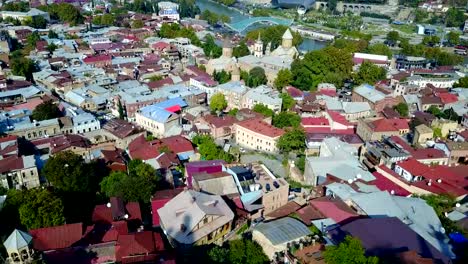 Aerial-View-Of-Old-Part-Tbilisi-City-In-Georgia-Tile-Roofs